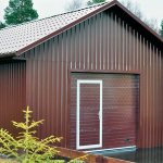 Corrugated garage with sectional doors