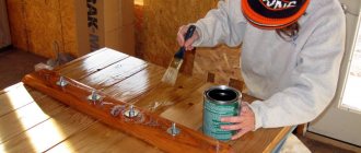 Applying water-based varnish to a wooden surface