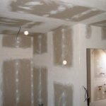 Do I need to apply a primer before wallpapering drywall?