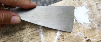 Puttying defects on wood