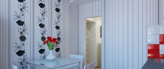 Thin vertical stripes on white wallpaper in the kitchen
